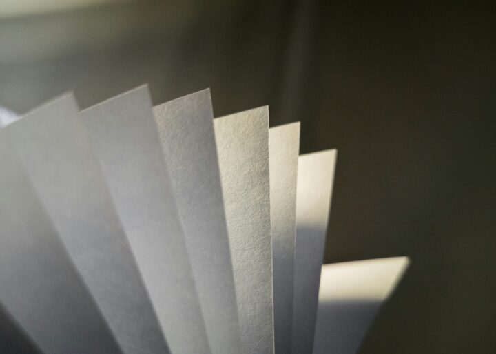 Photo of a paper stack lit by sunlight.